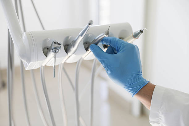 Professional Tooth Extraction technician working in Marine, IL